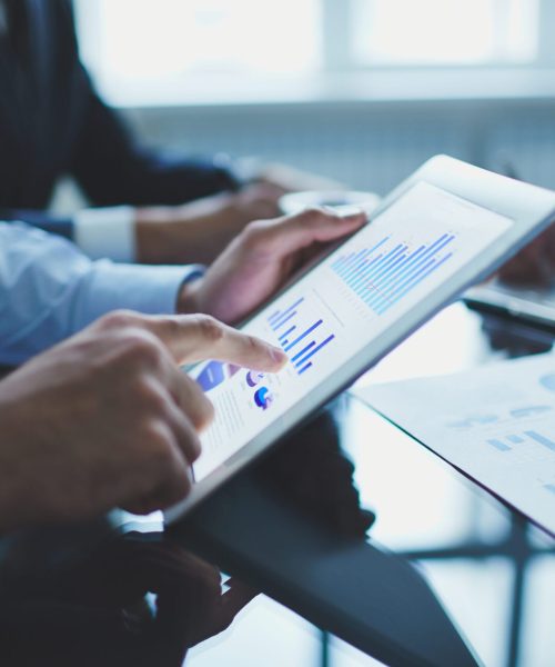 DEUTSCHE BANK SECURITIES INC., JP MORGAN SECURITIES LLC, AND BANCO BTG PACTUAL S.A. CAYMAN BRANCH ON GEOPARK LTD. BOND ISSUANCE Image of businessperson pointing at document in touchpad at meeting