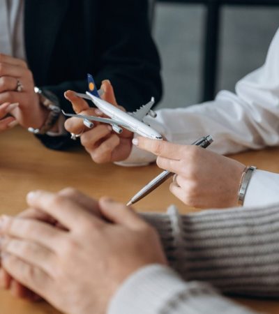 Travel conception. Close up view of people in airline company.
